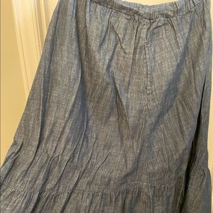 32w denim skirt with ruffle detail  draw string and pockets Length midi/mid calf
